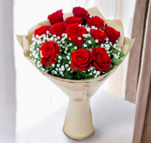 12 red roses with gypsophila