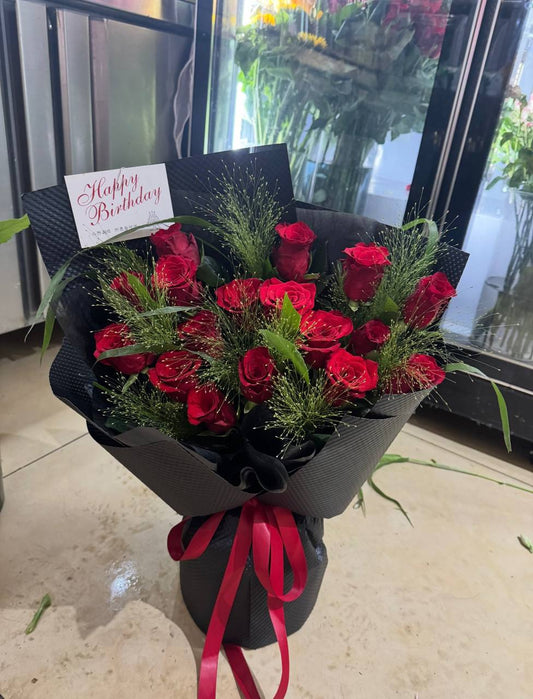 12 Bright red roses